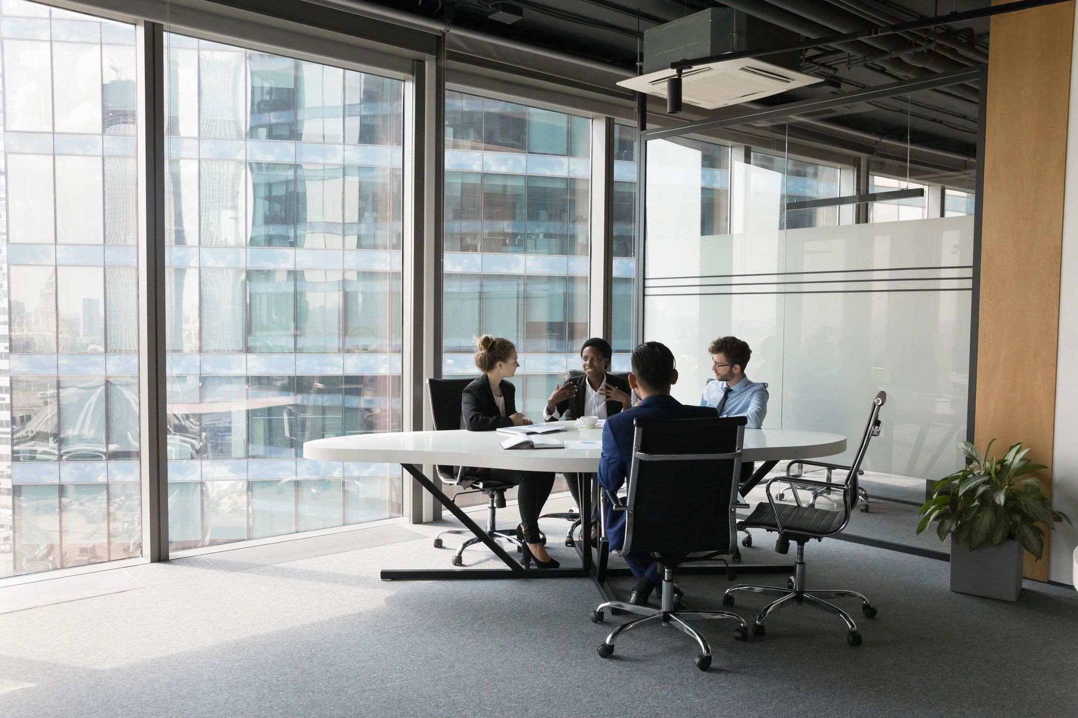 Professional team meeting in a modern briefing room